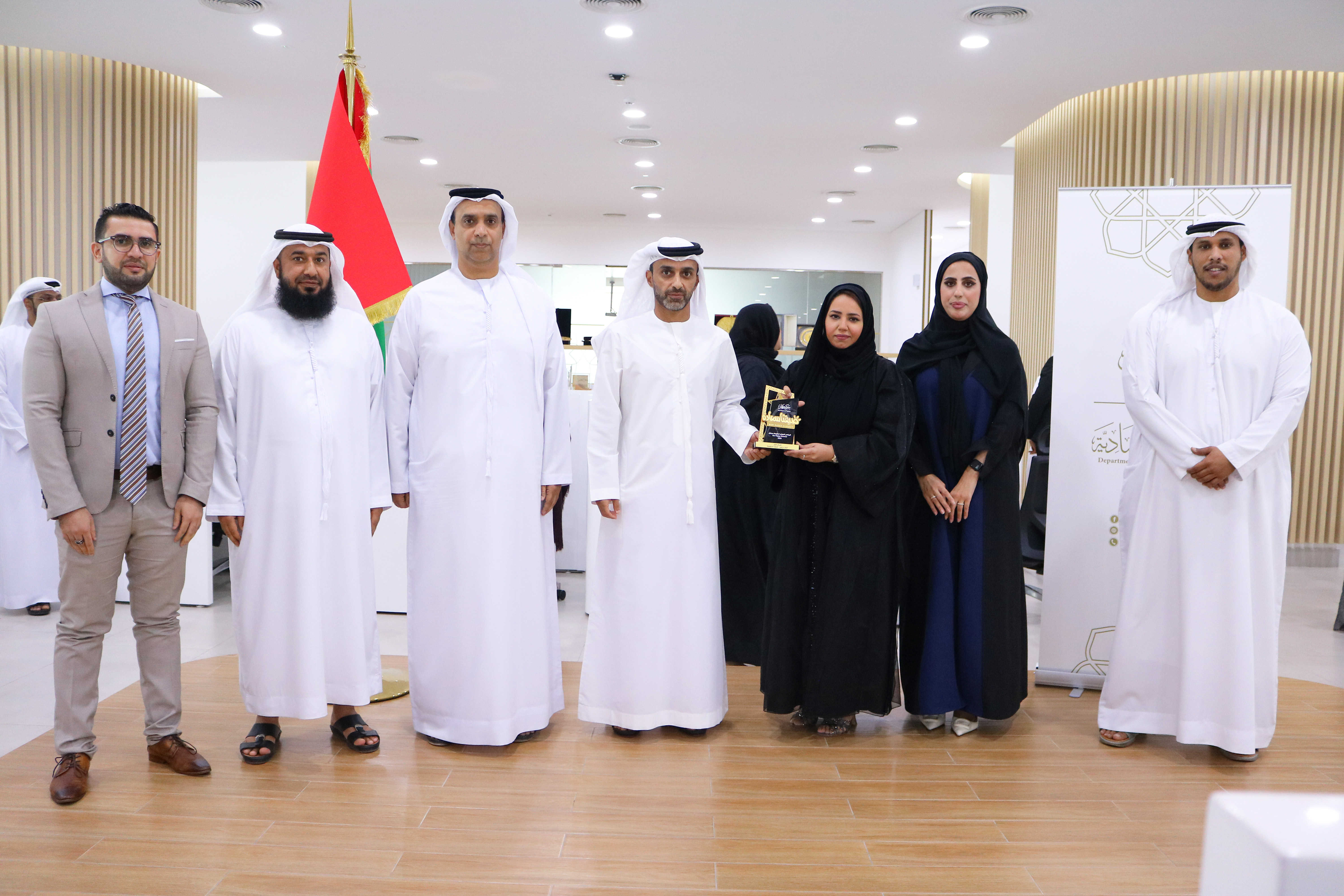 Ahmed bin Humaid Al Nuaimi honors an elite group of Ajman DED employees